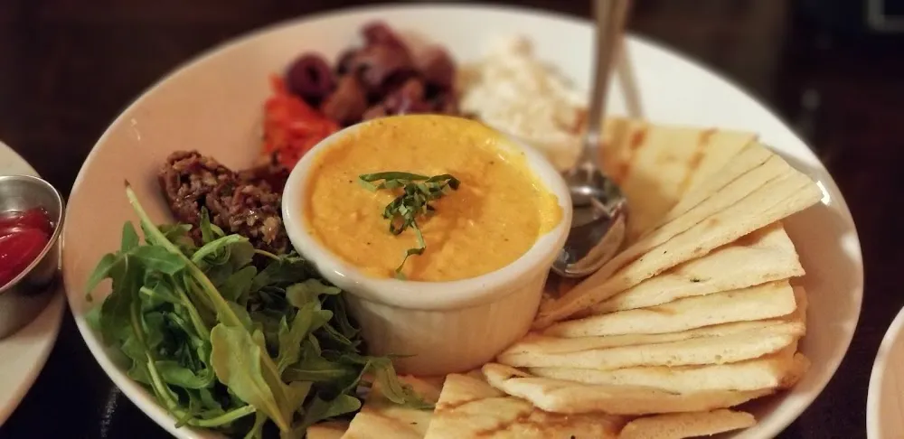 Roasted Red Pepper Hummus with Mushroom Tapenade Kalamata Olives Feta and Flatbread